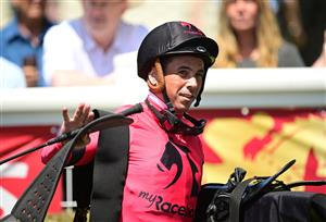 MELBOURNE, AUSTRALIA - FEBRUARY 11: Dean Holland riding So Unusual after winning Race 1, Premier Signs Handicap during Melbourne Racing at Sandown Hillside on February 11, 2023 in Melbourne, Australia. (Photo by Vince Caligiuri/Getty Images)