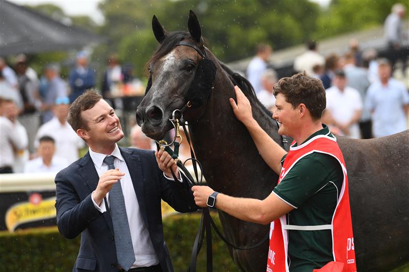 MELBOURNE, AUSTRALIA - FEBRUARY 25: Trainer Ben Hayes poses with Little Brose after winning in Race 7, the Ladbrokes Blue Diamond Stakes,  during Melbourne Racing at Sandown Lakeside on February 25, 2023 in Melbourne, Australia. (Photo by Vince Caligiuri/Getty Images)