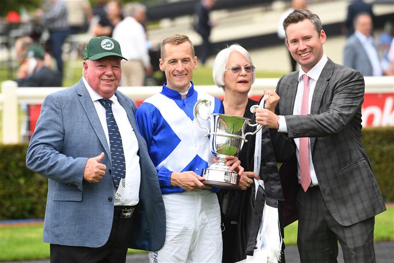 MELBOURNE, AUSTRALIA - FEBRUARY 25: Blake Shinn poses with trainer Adrian Bott and winning connections Jeff Simpson (L) after riding Alligator Blood to win Race 8, the Lamaro's Futurity Stakes, during Melbourne Racing at Sandown Lakeside on February 25, 2023 in Melbourne, Australia. (Getty)