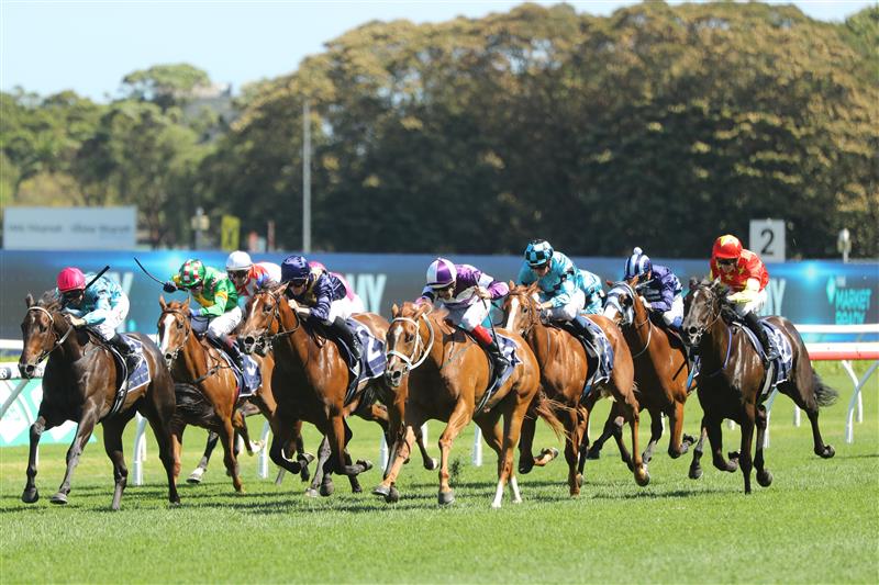 SYDNEY, AUSTRALIA - FEBRUARY 25: Hugh Bowman riding Lazzago wins Race 6 Catanach’s Sweet Embrace Stakes during TAB Chipping Norton Stakes Day - Sydney Racing at Royal Randwick Racecourse on February 25, 2023 in Sydney, Australia. (Photo by Jeremy Ng/Getty Images)