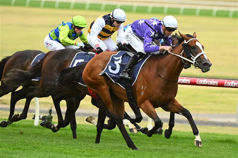 MELBOURNE, AUSTRALIA - FEBRUARY 25: Jye McNeil riding Espiona (L) winning Race 3, the Catanach's Jewellers Mannerism Stakes, during Melbourne Racing at Sandown Lakeside on February 25, 2023 in Melbourne, Australia. (Getty)