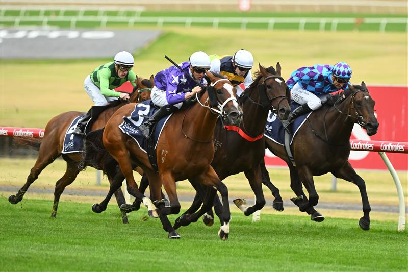 MELBOURNE, AUSTRALIA - FEBRUARY 25: Jye McNeil riding Espiona (L) winning Race 3, the Catanach's Jewellers Mannerism Stakes, during Melbourne Racing at Sandown Lakeside on February 25, 2023 in Melbourne, Australia. (Getty)