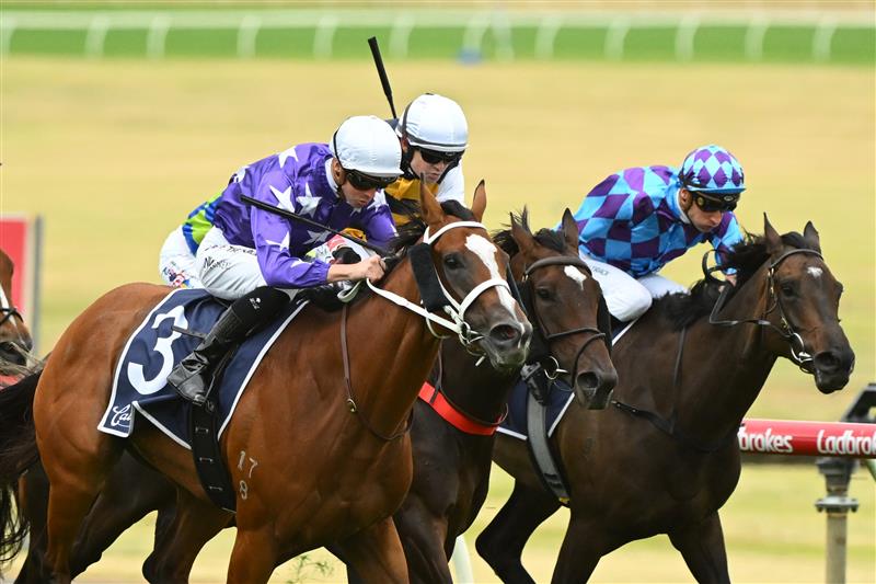 MELBOURNE, AUSTRALIA - FEBRUARY 25: Jye McNeil riding Espiona (L) winning Race 3, the Catanach's Jewellers Mannerism Stakes, during Melbourne Racing at Sandown Lakeside on February 25, 2023 in Melbourne, Australia. (Getty)
