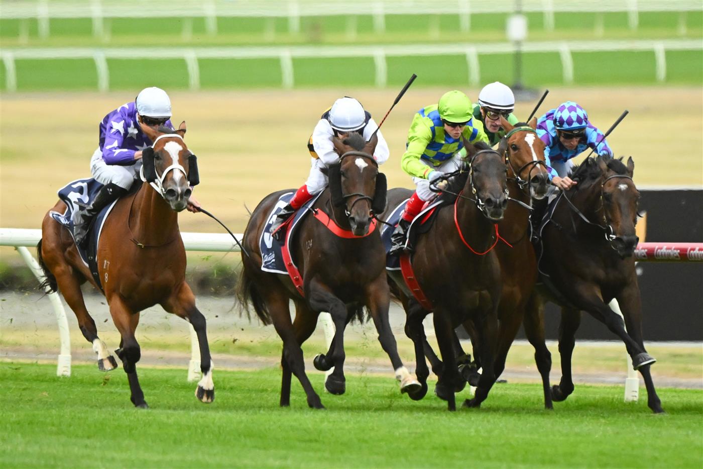 MELBOURNE, AUSTRALIA - FEBRUARY 25: Jye McNeil riding Espiona (L) winning Race 3, the Catanach's Jewellers Mannerism Stakes, during Melbourne Racing at Sandown Lakeside on February 25, 2023 in Melbourne, Australia. (Getty)