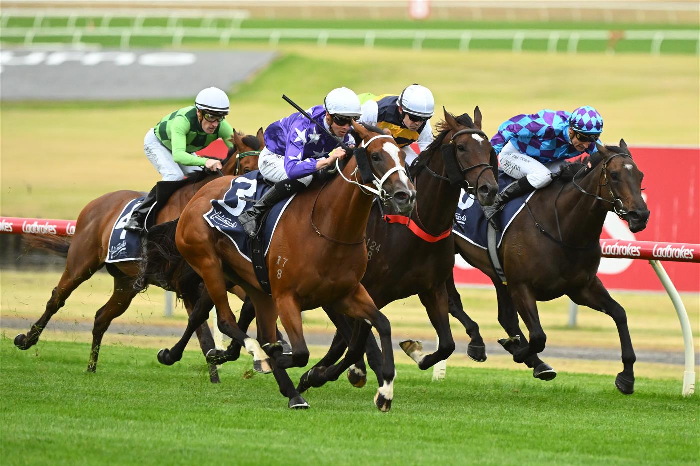 MELBOURNE, AUSTRALIA - FEBRUARY 25: Jye McNeil riding Espiona (L) winning Race 3, the Catanach's Jewellers Mannerism Stakes, during Melbourne Racing at Sandown Lakeside on February 25, 2023 in Melbourne, Australia. (Getty)