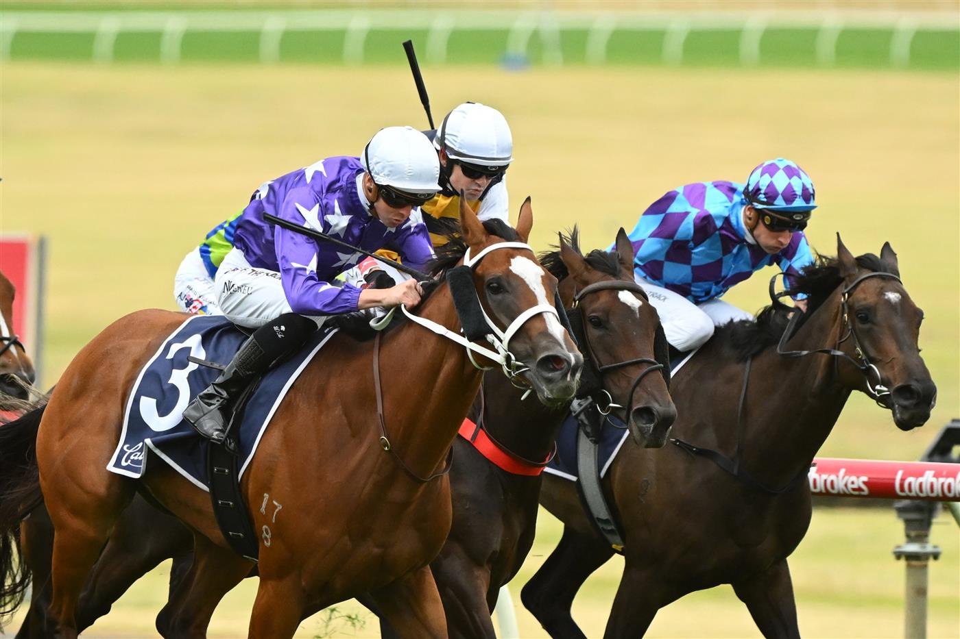 MELBOURNE, AUSTRALIA - FEBRUARY 25: Jye McNeil riding Espiona (L) winning Race 3, the Catanach's Jewellers Mannerism Stakes, during Melbourne Racing at Sandown Lakeside on February 25, 2023 in Melbourne, Australia. (Getty)