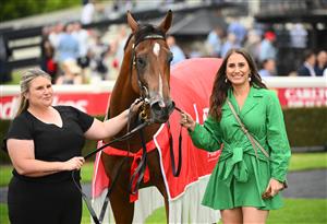 MELBOURNE, AUSTRALIA - FEBRUARY 25: Caitlin Hoysted (r) poses with Uncommon James after winning Race 9, the Ladbrokes Oakleigh Plate,  during Melbourne Racing at Sandown Lakeside on February 25, 2023 in Melbourne, Australia. (Photo by Vince Caligiuri/Getty Images)