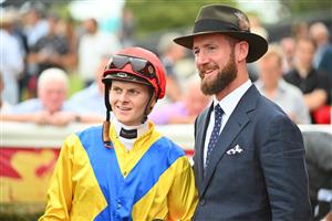 MELBOURNE, AUSTRALIA - FEBRUARY 25: Ethan Brown poses with Trainer Ciaron Maher after riding Right You Are to win Race 1, the Ladbrokes Victoria Gold Cup, during Melbourne Racing at Sandown Lakeside on February 25, 2023 in Melbourne, Australia. (Photo by Vince Caligiuri/Getty Images)