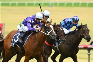 MELBOURNE, AUSTRALIA - FEBRUARY 25: Jye McNeil riding Espiona (L) winning Race 3, the Catanach's Jewellers Mannerism Stakes, during Melbourne Racing at Sandown Lakeside on February 25, 2023 in Melbourne, Australia. (Getty)