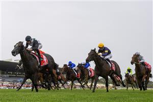 MELBOURNE, AUSTRALIA - FEBRUARY 25: Michael Dee riding Little Brose win Race 7, the Ladbrokes Blue Diamond Stakes,  during Melbourne Racing at Sandown Lakeside on February 25, 2023 in Melbourne, Australia. (Photo by Vince Caligiuri/Getty Images)