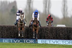 NEWBURY, ENGLAND - MARCH 04: Jonathan Burke riding The Big Bite (L) clear the last to win The BetVictor Greatwood Gold Cup Handicap Chase at Newbury Racecourse on March 04, 2023 in Newbury, England. (Photo by Alan Crowhurst/Getty Images)