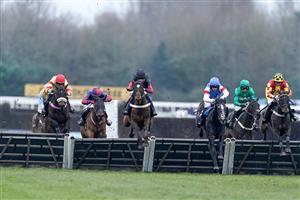 NEWBURY, ENGLAND - MARCH 04: Theo Gillard riding Fruit N Nut (black/red) clear the last to win The Make Your Best Bet At BetVictor Handicap Hurdle at Newbury Racecourse on March 04, 2023 in Newbury, England. (Photo by Alan Crowhurst/Getty Images)