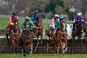 ESHER, ENGLAND - MARCH 11: Jamie Moore riding Spirit D'Aunou (3L, dark green) on their way to winning The Racing Only Bettor Podcast Juvenile Handicap Hurdle at Sandown Park on March 11, 2023 in Esher, England. (Photo by Alan Crowhurst/Getty Images)