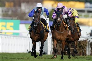 ESHER, ENGLAND - MARCH 11: Harry Cobden riding Iceo (pink) clear the last to win The Betfair Imperial Cup Handicap Hurdle at Sandown Park on March 11, 2023 in Esher, England. (Photo by Alan Crowhurst/Getty Images)