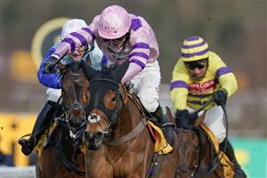 ESHER, ENGLAND - MARCH 11: Harry Cobden riding Iceo (pink) clear the last to win The Betfair Imperial Cup Handicap Hurdle at Sandown Park on March 11, 2023 in Esher, England. (Photo by Alan Crowhurst/Getty Images)