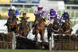 ESHER, ENGLAND - MARCH 11: Harry Cobden riding Iceo (pink) clear the last to win The Betfair Imperial Cup Handicap Hurdle at Sandown Park on March 11, 2023 in Esher, England. (Photo by Alan Crowhurst/Getty Images)