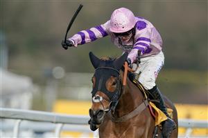 ESHER, ENGLAND - MARCH 11: Harry Cobden riding Iceo (pink) clear the last to win The Betfair Imperial Cup Handicap Hurdle at Sandown Park on March 11, 2023 in Esher, England. (Photo by Alan Crowhurst/Getty Images)