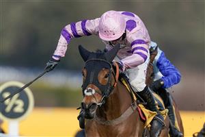 ESHER, ENGLAND - MARCH 11: Harry Cobden riding Iceo (pink) clear the last to win The Betfair Imperial Cup Handicap Hurdle at Sandown Park on March 11, 2023 in Esher, England. (Photo by Alan Crowhurst/Getty Images)