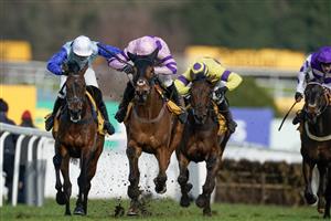 ESHER, ENGLAND - MARCH 11: Harry Cobden riding Iceo (pink) clear the last to win The Betfair Imperial Cup Handicap Hurdle at Sandown Park on March 11, 2023 in Esher, England. (Photo by Alan Crowhurst/Getty Images)