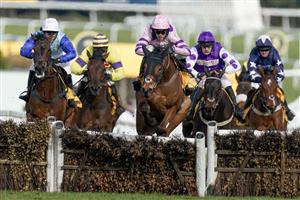 ESHER, ENGLAND - MARCH 11: Harry Cobden riding Iceo (pink) clear the last to win The Betfair Imperial Cup Handicap Hurdle at Sandown Park on March 11, 2023 in Esher, England. (Photo by Alan Crowhurst/Getty Images)