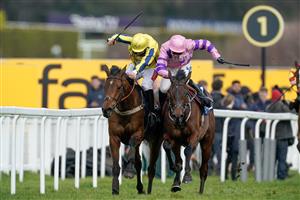 ESHER, ENGLAND - MARCH 11: Connor Brace riding Crambo (pink) clear the last to win The European Breeders' Fund Betfair 'National Hunt' Novices' Handicap Hurdle Final from Jamie Moore and Inneston (L) at Sandown Park on March 11, 2023 in Esher, England. (Photo by Alan Crowhurst/Getty Images)