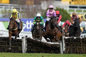 ESHER, ENGLAND - MARCH 11: Connor Brace riding Crambo (pink) clear the last to win The European Breeders' Fund Betfair 'National Hunt' Novices' Handicap Hurdle Final from Jamie Moore and Inneston (L) at Sandown Park on March 11, 2023 in Esher, England. (Photo by Alan Crowhurst/Getty Images)