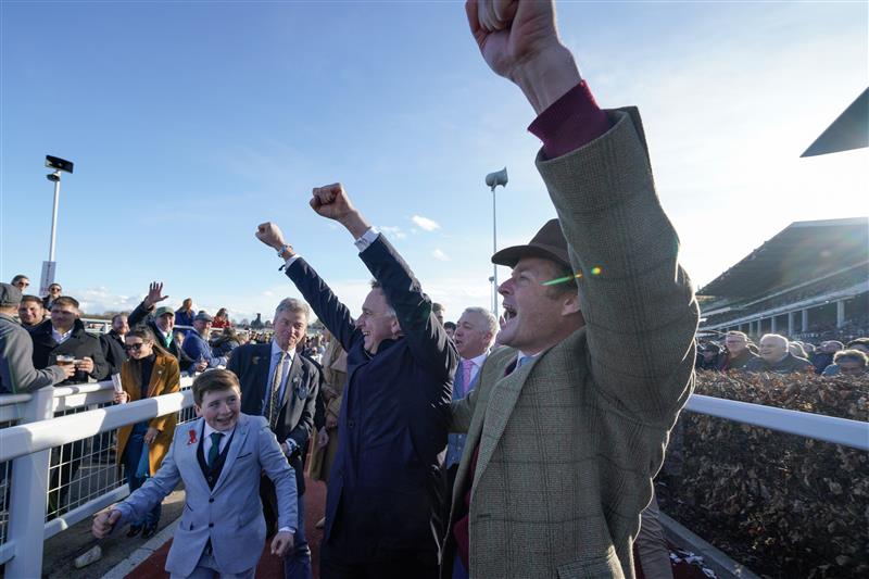 CHELTENHAM, ENGLAND - MARCH 14: Trainer Henry de Bromhead (C) celebrates after Rachael Blackmore rides Honeysuckle to win The Close Brothers Mares' Hurdle during day one of the Cheltenham Festival 2023 at Cheltenham Racecourse on March 14, 2023 in Cheltenham, England. (Photo by Alan Crowhurst/Getty Images)