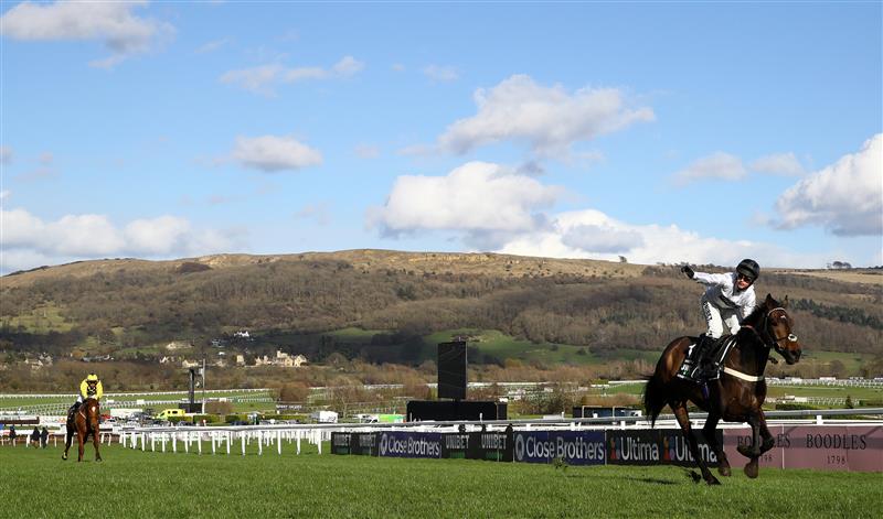 CHELTENHAM, ENGLAND - MARCH 14: Nico de Boinville celebrates on board Constitution Hill after winning the the Unibet Champion Hurdle Challenge Trophy ahead of State Man ridden by Paul Townend during day one of the Cheltenham Festival 2023 at Cheltenham Racecourse on March 14, 2023 in Cheltenham, England. (Photo by Michael Steele/Getty Images)