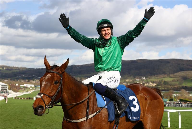 CHELTENHAM, ENGLAND - MARCH 14: Paul Townend celebrates on board El Fabiolo after winning the Sporting Life Arkle Challenge Trophy Novices' Chase during day one of the Cheltenham Festival 2023 at Cheltenham Racecourse on March 14, 2023 in Cheltenham, England. (Photo by Michael Steele/Getty Images)