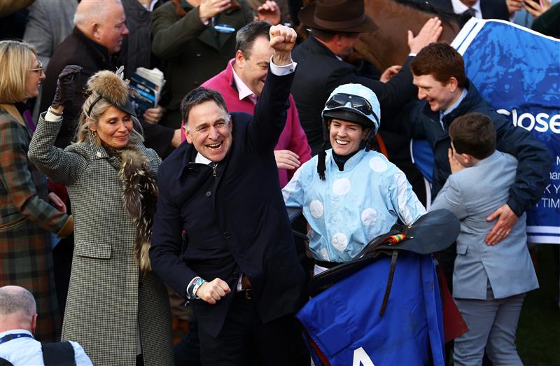 CHELTENHAM, ENGLAND - MARCH 14: Trainer Henry De Bromhead celebrates alongside Jockey Rachael Blackmore and Wife Heather De Bromhead after Honeysuckle won the Close Brothers Mares' Hurdle during day one of the Cheltenham Festival 2023 at Cheltenham Racecourse on March 14, 2023 in Cheltenham, England. (Photo by Michael Steele/Getty Images)