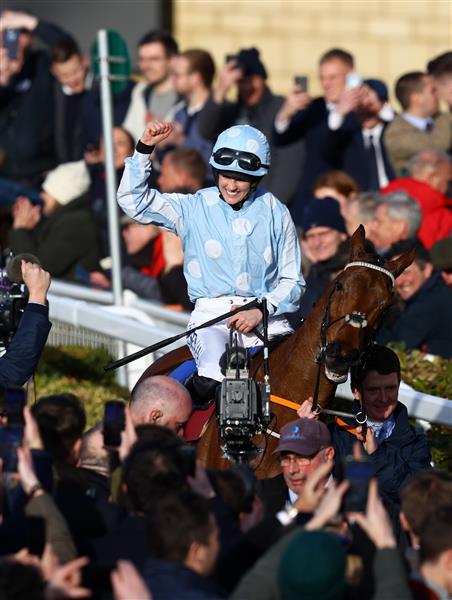CHELTENHAM, ENGLAND - MARCH 14: Rachael Blackmore celebrates on board Honeysuckle after winning the Close Brothers Mares' Hurdle during day one of the Cheltenham Festival 2023 at Cheltenham Racecourse on March 14, 2023 in Cheltenham, England. (Photo by Michael Steele/Getty Images)