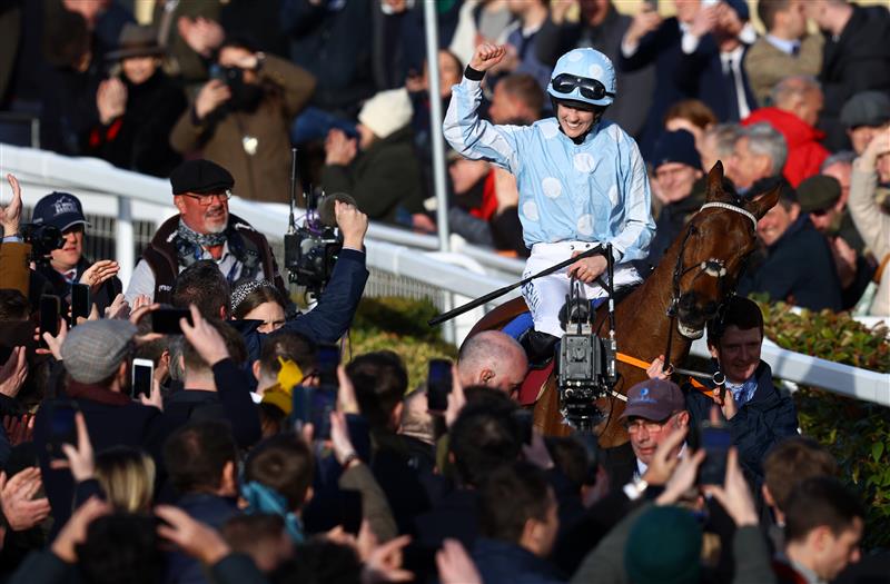 CHELTENHAM, ENGLAND - MARCH 14: Rachael Blackmore celebrates on board Honeysuckle after winning the Close Brothers Mares' Hurdle during day one of the Cheltenham Festival 2023 at Cheltenham Racecourse on March 14, 2023 in Cheltenham, England. (Photo by Michael Steele/Getty Images)