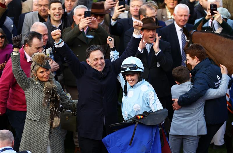 CHELTENHAM, ENGLAND - MARCH 14: Trainer Henry De Bromhead celebrates alongside Jockey Rachael Blackmore and Wife Heather De Bromhead after Honeysuckle won the Close Brothers Mares' Hurdle during day one of the Cheltenham Festival 2023 at Cheltenham Racecourse on March 14, 2023 in Cheltenham, England. (Photo by Michael Steele/Getty Images)