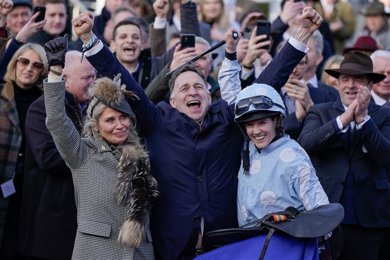 CHELTENHAM, ENGLAND - MARCH 14: Trainer Henry de Bromhead (C) celebrates with wife Heather (L) after Rachael Blackmore rides Honeysuckle to win The Close Brothers Mares' Hurdle during day one of the Cheltenham Festival 2023 at Cheltenham Racecourse on March 14, 2023 in Cheltenham, England. (Photo by Alan Crowhurst/Getty Images)