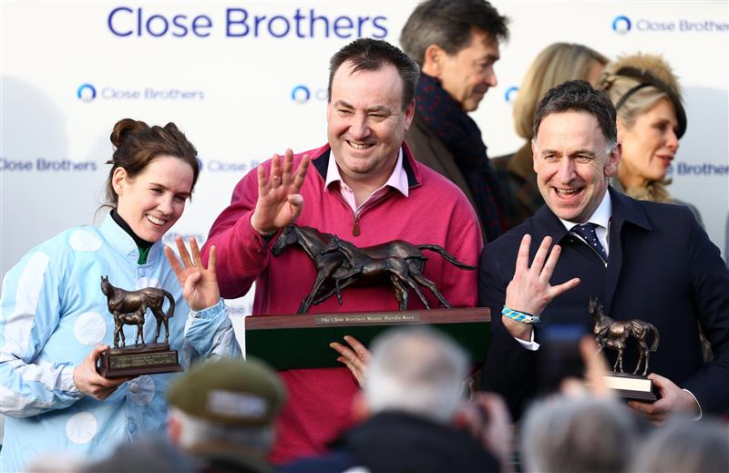 CHELTENHAM, ENGLAND - MARCH 14: Rachael Blackmore poses alognside Trainer Henry De Bromhead (R) and Owner Kenny Alexander(C) after winning the Close Brothers Mares' Hurdle on board Honeysuckle during day one of the Cheltenham Festival 2023 at Cheltenham Racecourse on March 14, 2023 in Cheltenham, England. (Photo by Michael Steele/Getty Images)