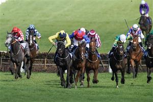 CHELTENHAM, ENGLAND - MARCH 14: Michael O'Sullivan riding Marine Nationale (yellow) clear the last to win The Sky Bet Supreme Novices' Hurdle during day one of the Cheltenham Festival 2023 at Cheltenham Racecourse on March 14, 2023 in Cheltenham, England. (Photo by Alan Crowhurst/Getty Images)