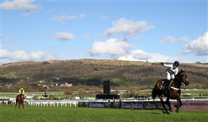 CHELTENHAM, ENGLAND - MARCH 14: Nico de Boinville celebrates on board Constitution Hill after winning the the Unibet Champion Hurdle Challenge Trophy ahead of State Man ridden by Paul Townend during day one of the Cheltenham Festival 2023 at Cheltenham Racecourse on March 14, 2023 in Cheltenham, England. (Photo by Michael Steele/Getty Images)
