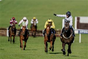 CHELTENHAM, ENGLAND - MARCH 14: Nico de Boinville riding Constitution Hill (white) win The Unibet Champion Hurdle Challenge Trophy during day one of the Cheltenham Festival 2023 at Cheltenham Racecourse on March 14, 2023 in Cheltenham, England. (Photo by Alan Crowhurst/Getty Images)