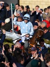 CHELTENHAM, ENGLAND - MARCH 14: Rachael Blackmore celebrates on board Honeysuckle after winning the Close Brothers Mares' Hurdle during day one of the Cheltenham Festival 2023 at Cheltenham Racecourse on March 14, 2023 in Cheltenham, England. (Photo by Michael Steele/Getty Images)
