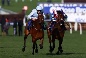 CHELTENHAM, ENGLAND - MARCH 14: Rachael Blackmore on board Honeysuckle leads Jonathan Burke on board Love Envoi to win the Close Brothers Mares' Hurdle during day one of the Cheltenham Festival 2023 at Cheltenham Racecourse on March 14, 2023 in Cheltenham, England. (Photo by Michael Steele/Getty Images)