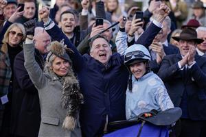 CHELTENHAM, ENGLAND - MARCH 14: Trainer Henry de Bromhead (C) celebrates with wife Heather (L) after Rachael Blackmore rides Honeysuckle to win The Close Brothers Mares' Hurdle during day one of the Cheltenham Festival 2023 at Cheltenham Racecourse on March 14, 2023 in Cheltenham, England. (Photo by Alan Crowhurst/Getty Images)