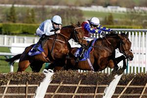 CHELTENHAM, ENGLAND - MARCH 14: Rachael Blackmore riding Honeysuckle (L) clear the last to win The Close Brothers Mares' Hurdle during day one of the Cheltenham Festival 2023 at Cheltenham Racecourse on March 14, 2023 in Cheltenham, England. (Photo by Alan Crowhurst/Getty Images)