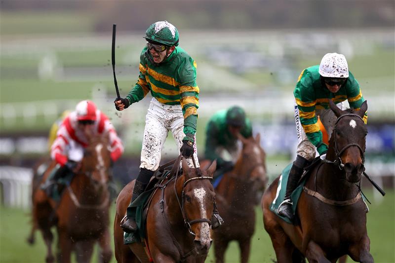 CHELTENHAM, ENGLAND - MARCH 15: John Gleeson riding A Dream to Share celebrates winning the Champion Bumper during day two of the Cheltenham Festival 2023 at Cheltenham Racecourse on March 15, 2023 in Cheltenham, England. (Photo by Michael Steele/Getty Images)