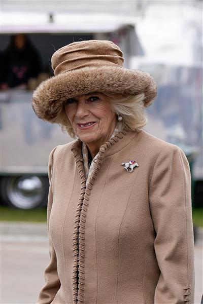 CHELTENHAM, ENGLAND - MARCH 15: Camilla, Queen Consort arrivesat the track during day two of the Cheltenham Festival 2023 at Cheltenham Racecourse on March 15, 2023 in Cheltenham, England. (Photo by Alan Crowhurst/Getty Images)