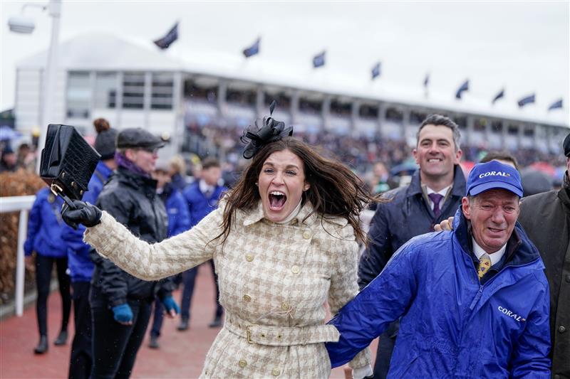 CHELTENHAM, ENGLAND - MARCH 15: Winning connections from the owners and stable staff celebrate the victory of Harry Skelton riding Langer Dan to victory in The Coral Cup Handicap Hurdle during day two of the Cheltenham Festival 2023 at Cheltenham Racecourse on March 15, 2023 in Cheltenham, England. (Photo by Alan Crowhurst/Getty Images)
