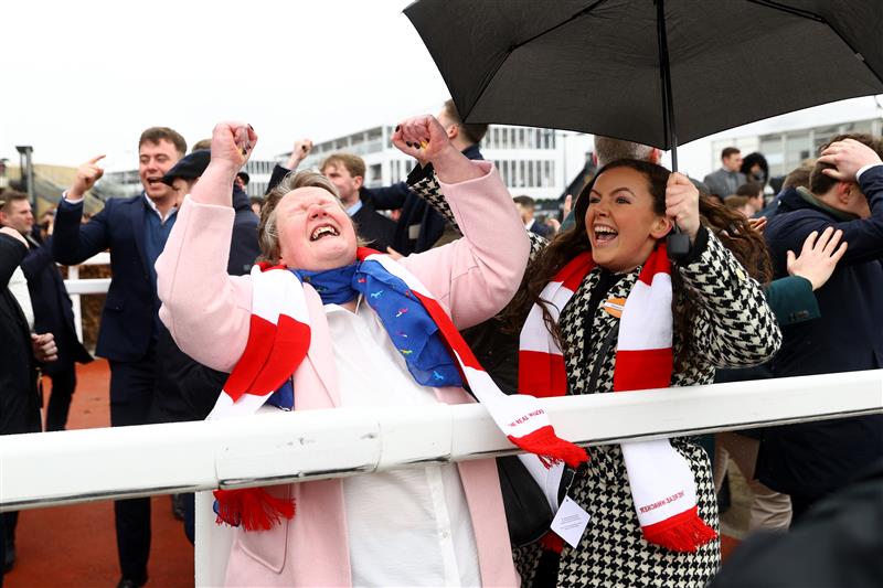 CHELTENHAM, ENGLAND - MARCH 15: Owners and trainers watch The Real Whacker win the Brown Advisory Novices' Chase during day two of the Cheltenham Festival 2023 at Cheltenham Racecourse on March 15, 2023 in Cheltenham, England. (Photo by Michael Steele/Getty Images)