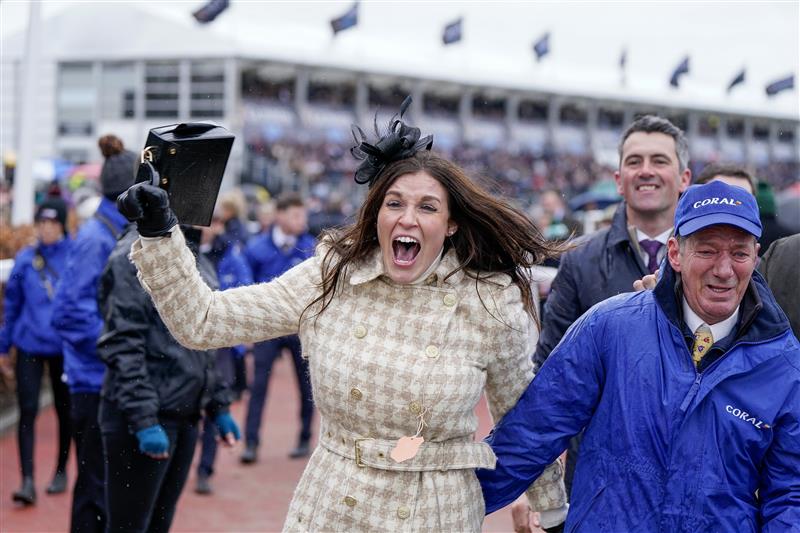 CHELTENHAM, ENGLAND - MARCH 15: Winning connections from the owners and stable staff celebrate the victory of Harry Skelton riding Langer Dan to victory in The Coral Cup Handicap Hurdle during day two of the Cheltenham Festival 2023 at Cheltenham Racecourse on March 15, 2023 in Cheltenham, England. (Photo by Alan Crowhurst/Getty Images)