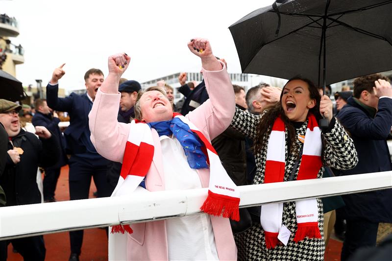 CHELTENHAM, ENGLAND - MARCH 15: Owners and trainers watch The Real Whacker win the Brown Advisory Novices' Chase during day two of the Cheltenham Festival 2023 at Cheltenham Racecourse on March 15, 2023 in Cheltenham, England. (Photo by Michael Steele/Getty Images)