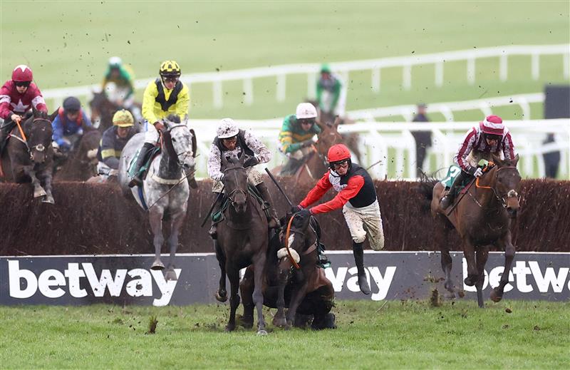 CHELTENHAM, ENGLAND - MARCH 15: Harry Cobden riding Thyme White is unseated during the Grand Annual Chase during day two of the Cheltenham Festival 2023 at Cheltenham Racecourse on March 15, 2023 in Cheltenham, England. (Photo by Michael Steele/Getty Images)