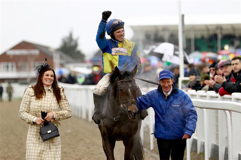 CHELTENHAM, ENGLAND - MARCH 15: Harry Skelton riding Langer Dan celebrates victory in the Coral Cup Hurdle during day two of the Cheltenham Festival 2023 at Cheltenham Racecourse on March 15, 2023 in Cheltenham, England. (Photo by Michael Steele/Getty Images)